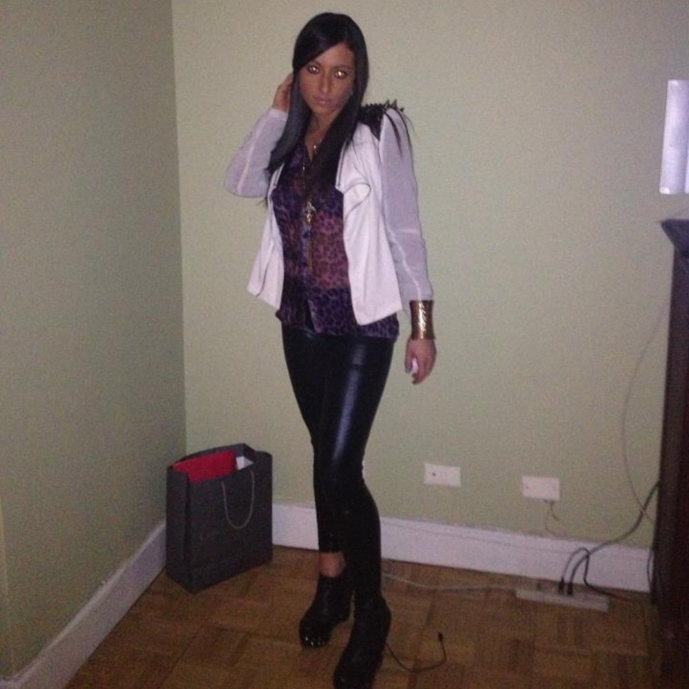 The White blazer with spikes